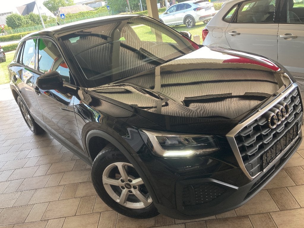 Q2 -Airco -Cruise -Apple Carplay/Android -LED -Zetelvwarm, Voorwielaandrijving, Stof, Zwart, 81 kW