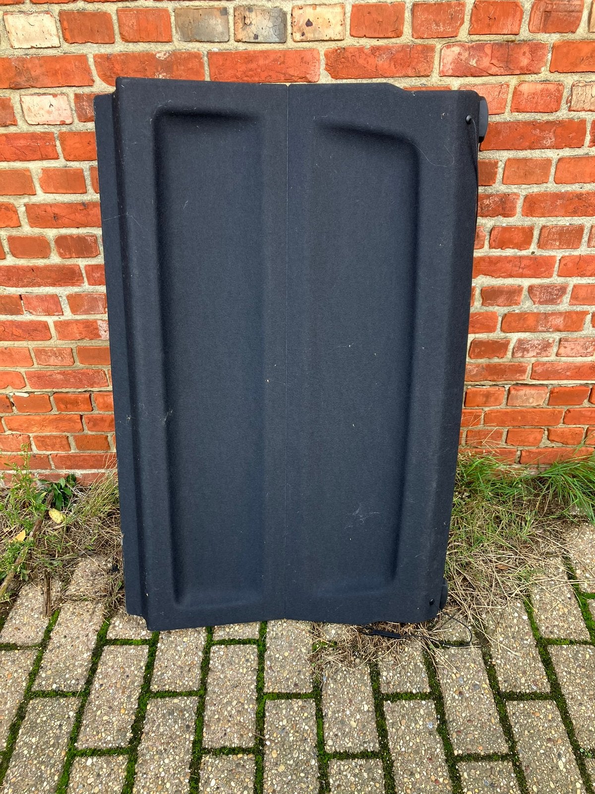 BMW X1 hoedenplank, Ophalen