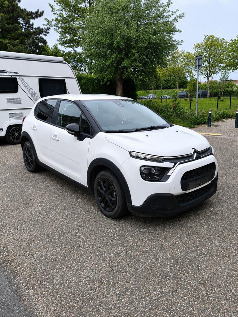 Citroen C3 2021 benzine 1.2 km 113000, Auto's, Citroën, Parkeersensor, Euro 6, Handgeschakeld, Stadsauto