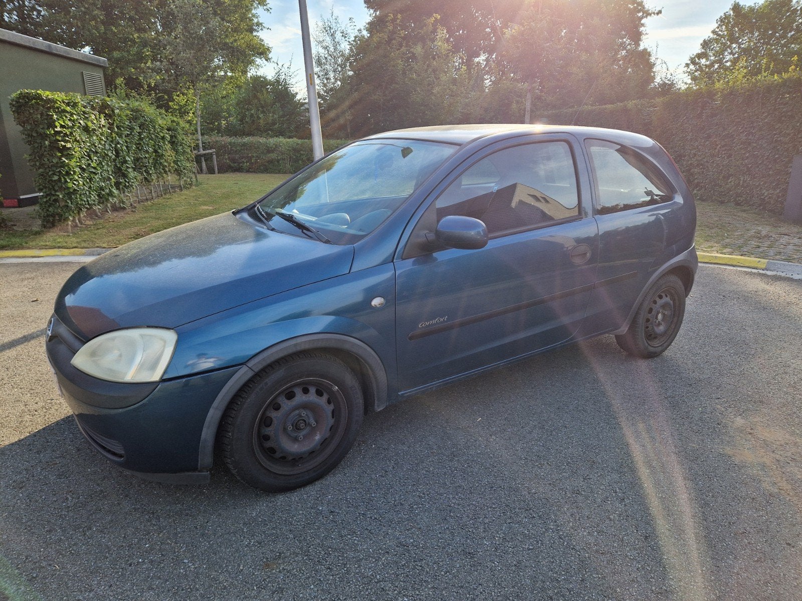 Opel Corsa 1.2 Benzine Comfort, Auto's, Stof, Zwart, Blauw, Handgeschakeld
