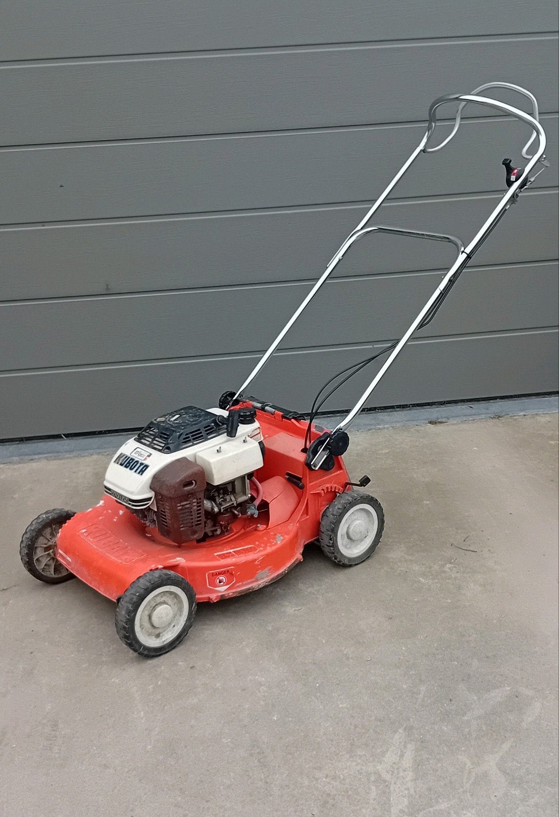 Grasmaaier kubota, Ophalen