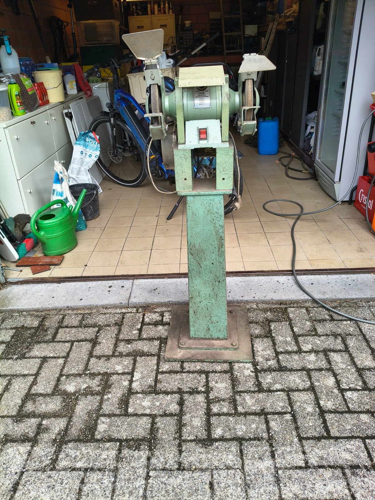 slijpmolen, amarel op voet ., Ophalen