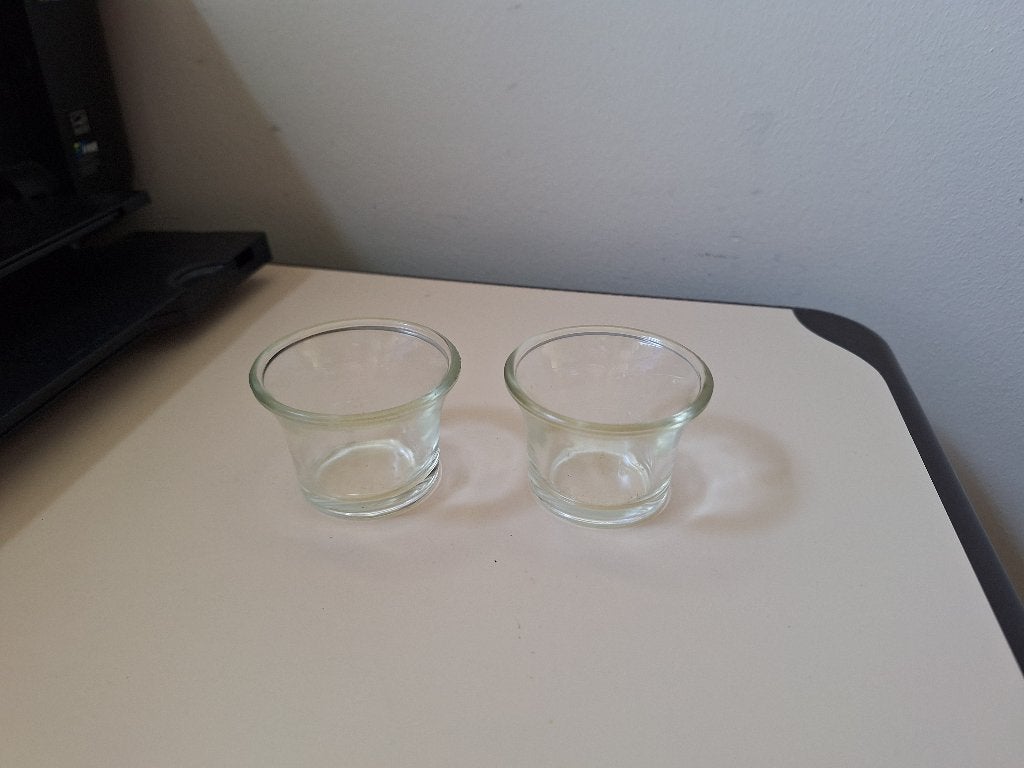 2 glazen waxinelichtjes, Ophalen of Verzenden, Zo goed als nieuw, Glas, Waxinelichthouder