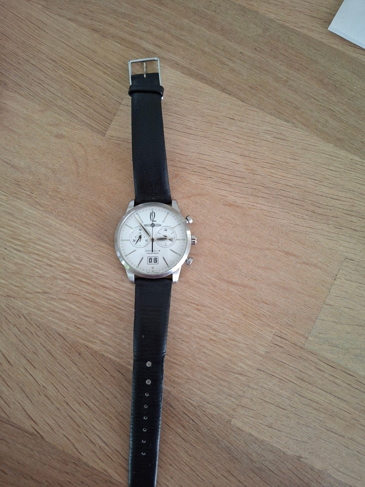 montre à quartz couleur acier et bracelet cuir, Montre-bracelet, Autres marques, Enlèvement ou Envoi, Cuir