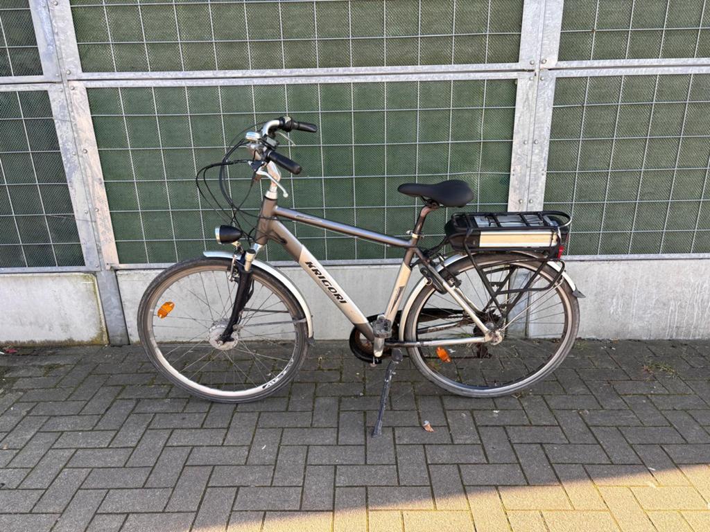 Elektrische mannenfiets Krigori, Ophalen, Gebruikt, 30 tot 50 km per accu, Overige merken