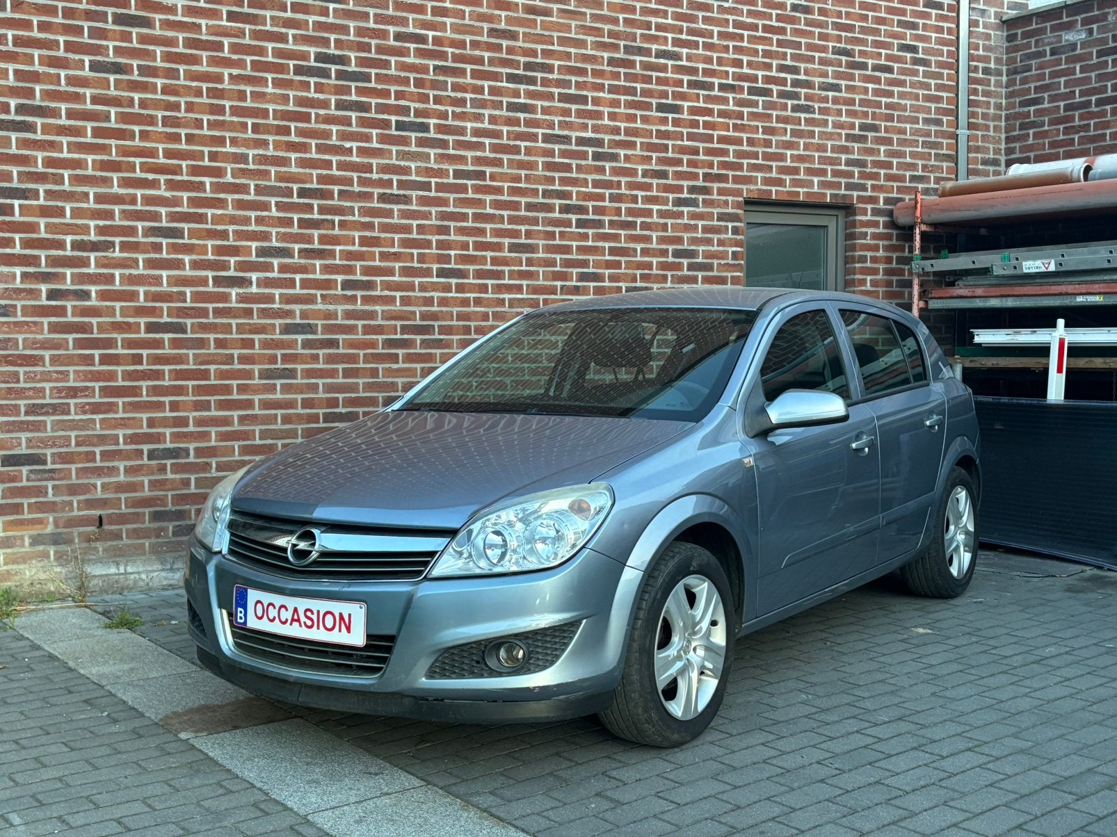 Opel Astra H 1.6i - 1e prop - Airco - 5 deuren, Voorwielaandrijving, Stof, 4 cilinders, Handgeschakeld