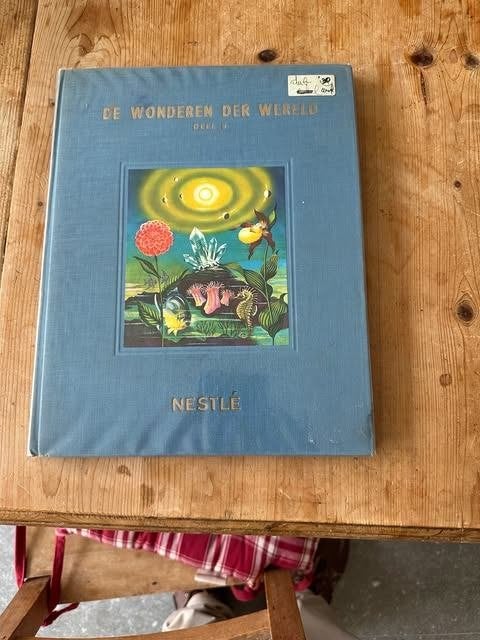 Nestlé de wonderen der wereld deel 5, Livres, Livres d'images & Albums d'images, Enlèvement ou Envoi, Comme neuf, Album d'images