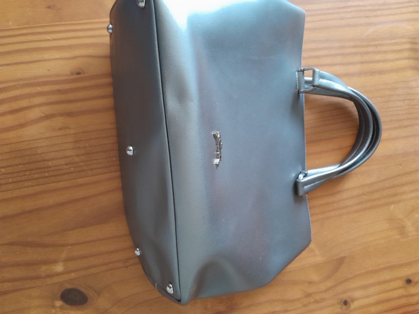 Longchamp handtas, Ophalen
