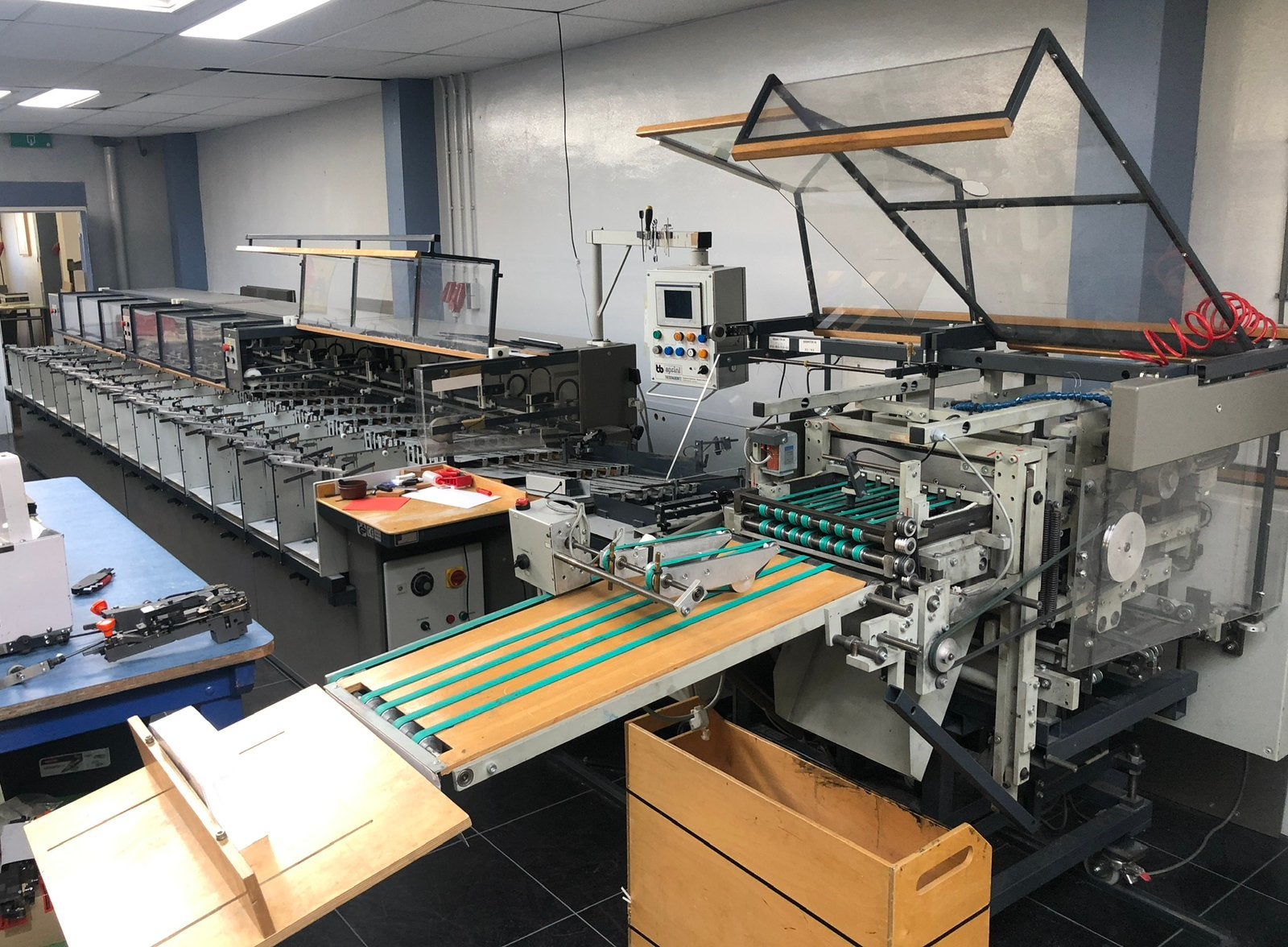 Vergaarmachine / bookletmaker, Ophalen