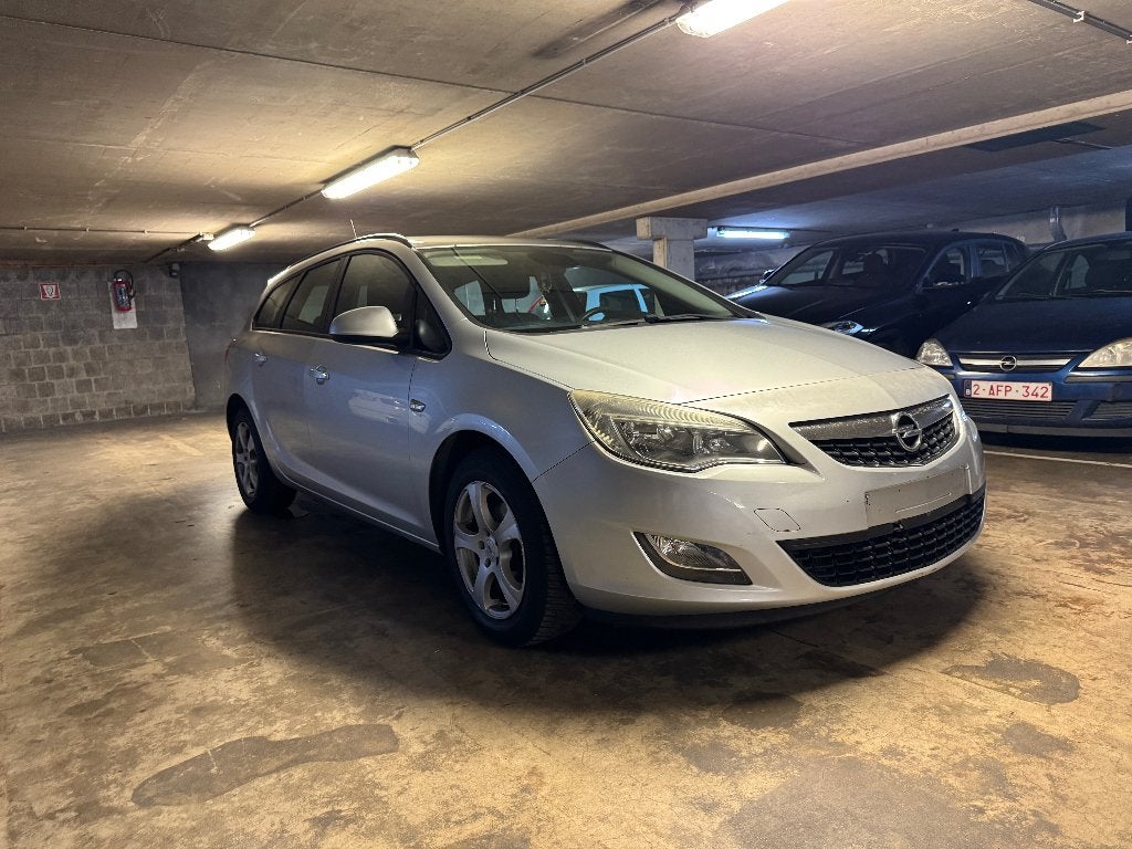Opel Astra Sports Tourer - Proper - Rijdt goed - GEKEURD, Auto's, Euro 5, Stof, Zwart, 4 cilinders