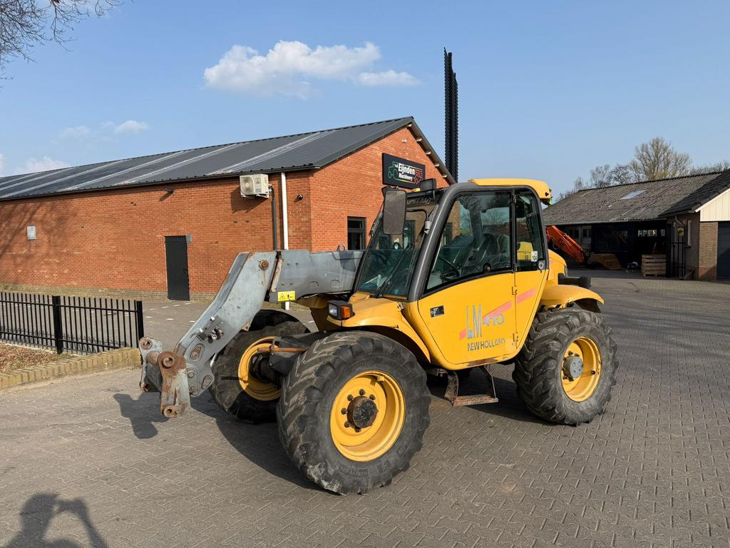 New holland LM410 verreiker (bj 2000), Enlèvement, Chariot télescopique