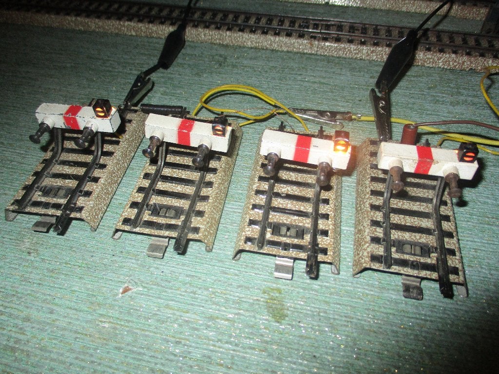 Marklin 4 butoirs éclairés 7191, Enlèvement ou Envoi, Utilisé, Rails, Märklin