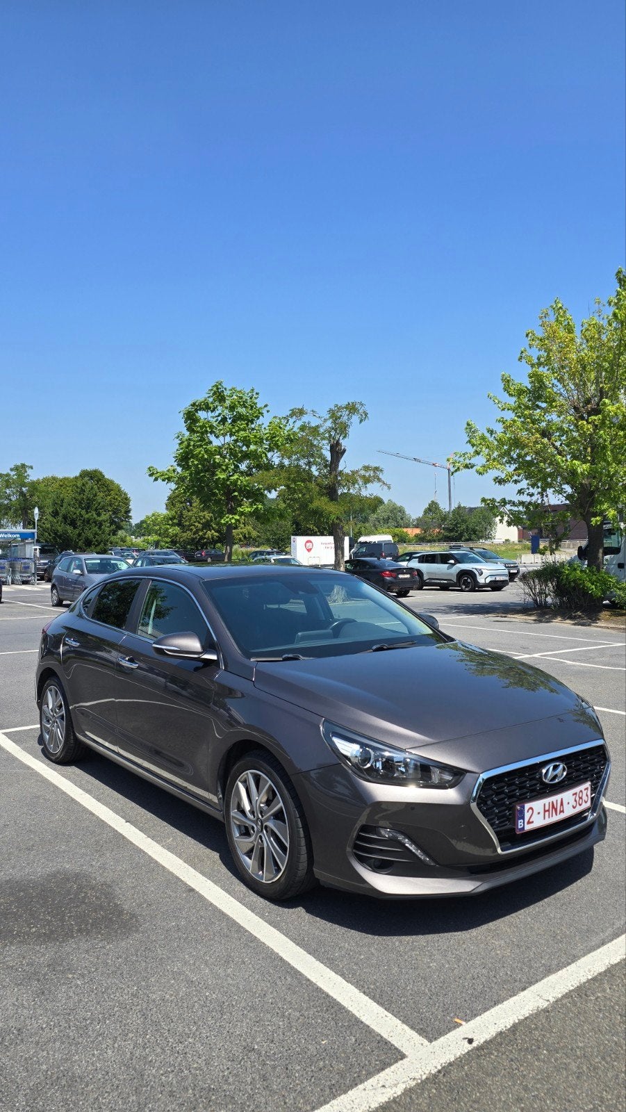 Hyundai i30 fastback, Auto's, 4 cilinders, Bruin, Leder en Stof, Handgeschakeld