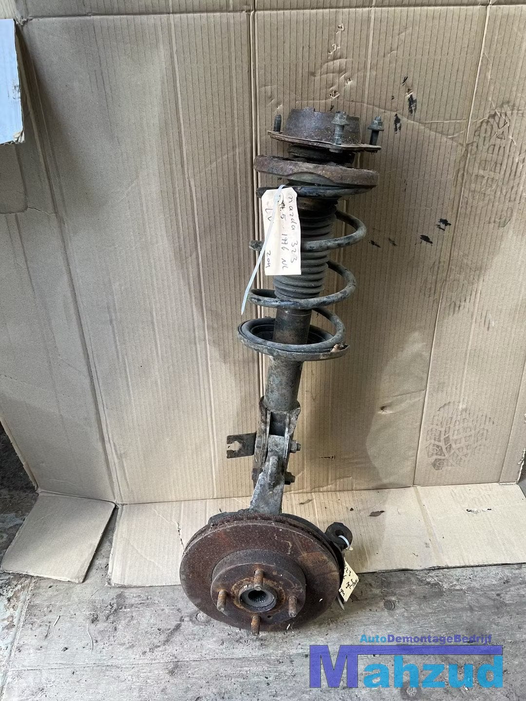 MAZDA 323 F 5 Veerpoot links voor fuseelager 94-98, Gebruikt, Shinchi, Fuchu-Cho 3-1
730-8670  Hiroshima, Mazda Motor Corporation