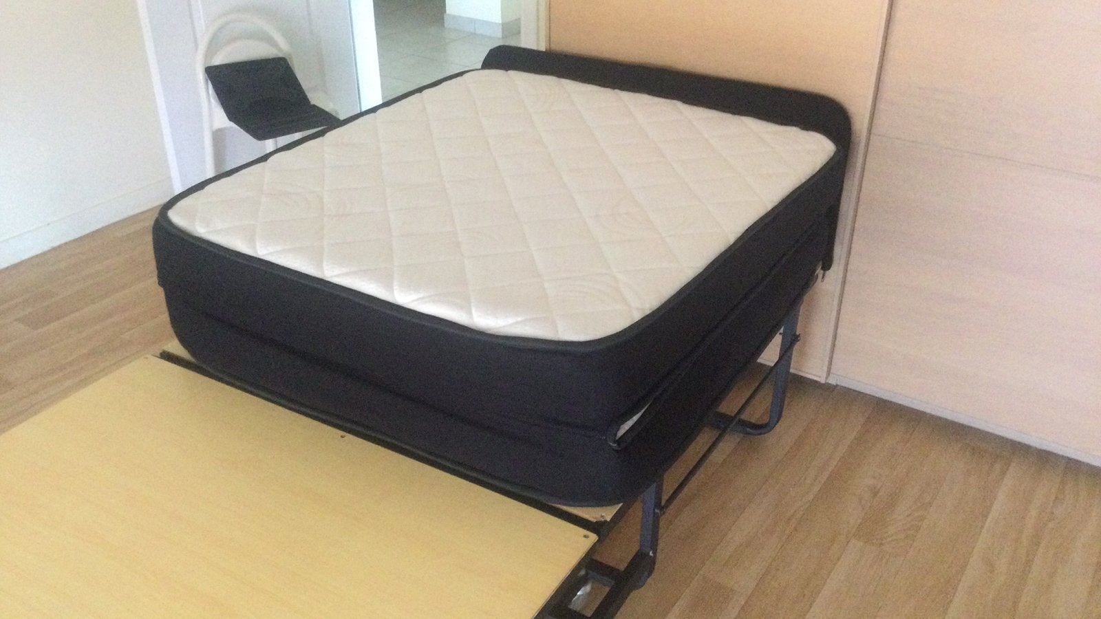 Opklapbaar logeerbed, Ophalen