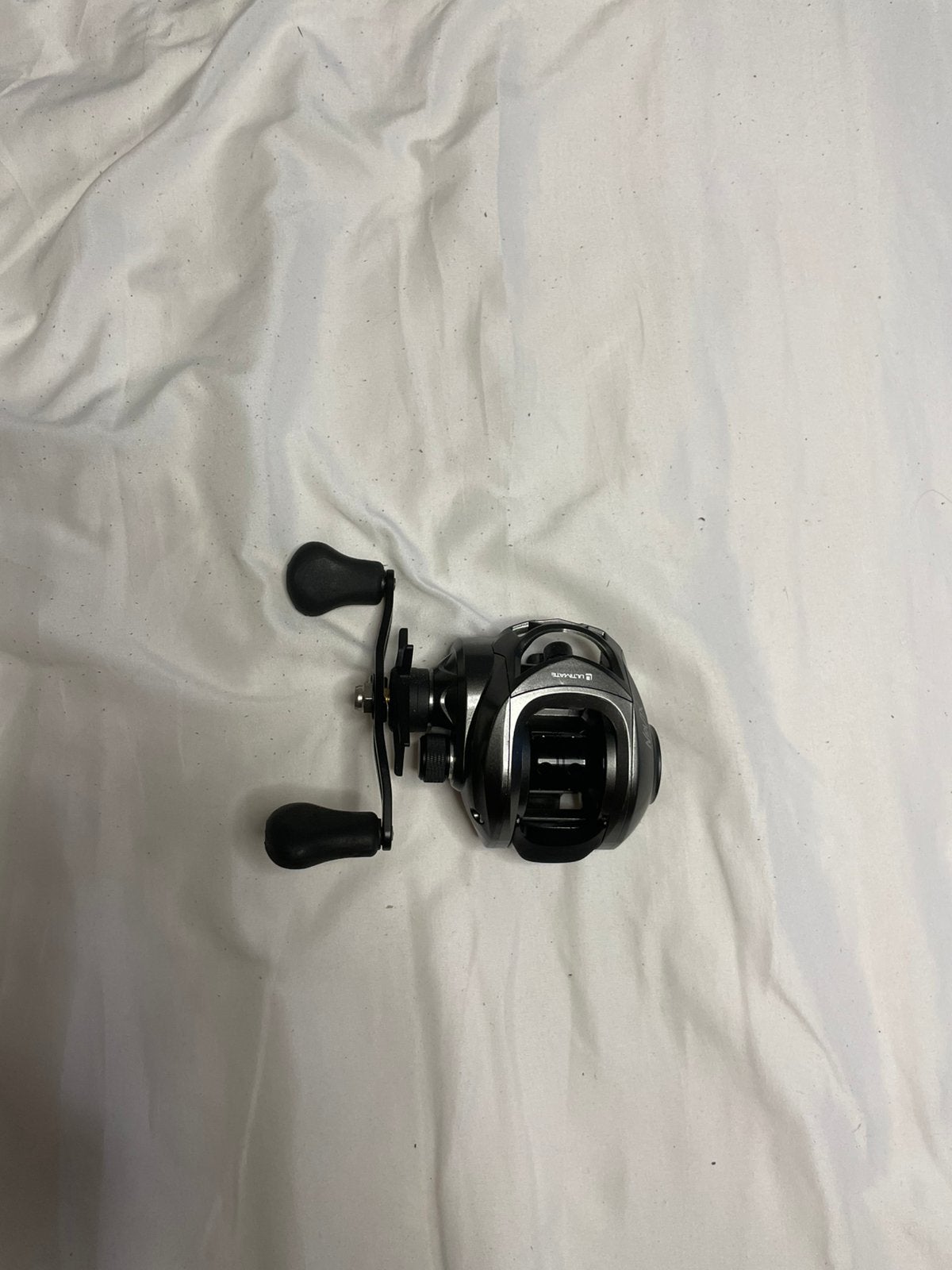 Baitcaster reel ultimate novix, Watersport en Boten, Hengelsport | Roofvissen, Ophalen, Zo goed als nieuw, Molen