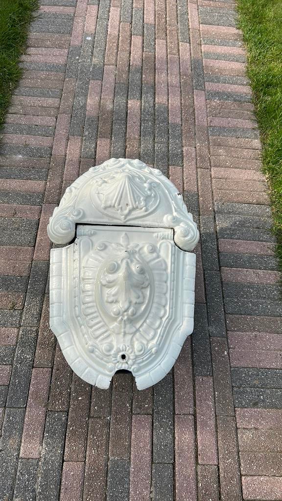 Gietijzer kolenbak, Ophalen
