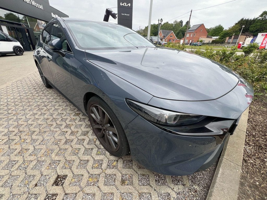 Mazda Mazda3 Hatchback 2.0 Skyactiv-G 90kW Skydrive Sport, Auto's, Mazda, Gebruikt, Zwart, 4 cilinders, https://public.car-pass.be/vhr/b99e25d7-3681-44d0-a6d4-aa66514fb2b0