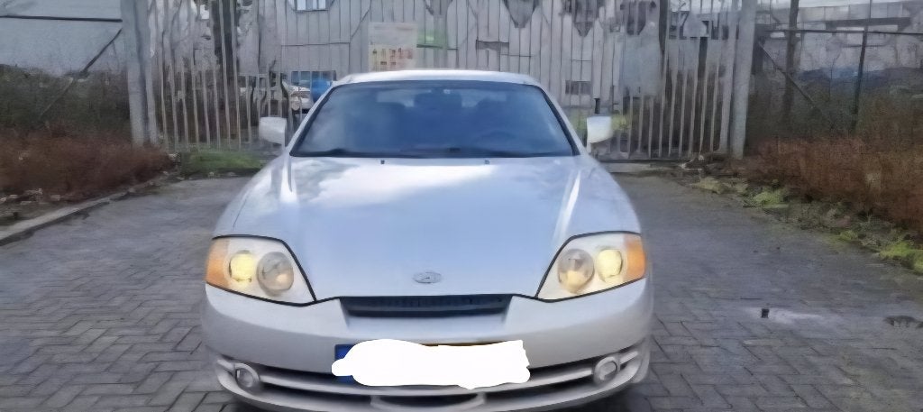 Hyundai coupé 2.0i 125dkm 2003 approuvé pour la vente, Autos, Argent ou Gris, Coupé, Boîte manuelle, Particulier