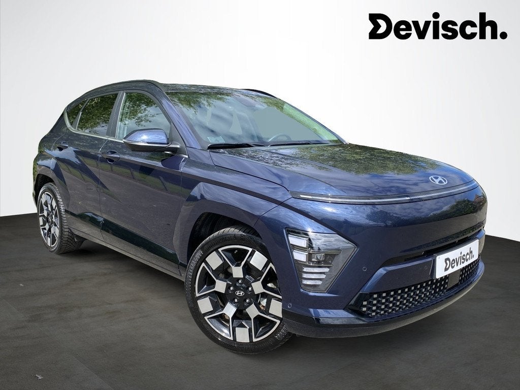 Hyundai KONA EV SHINE 65 kwh (bj 2024, automaat), Auto's, Gebruikt, Zwart, Blauw, Leder