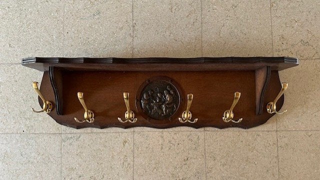 kapstok hoedenplank, Ophalen