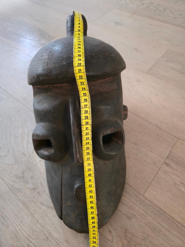 Afrikaans masker, Ophalen