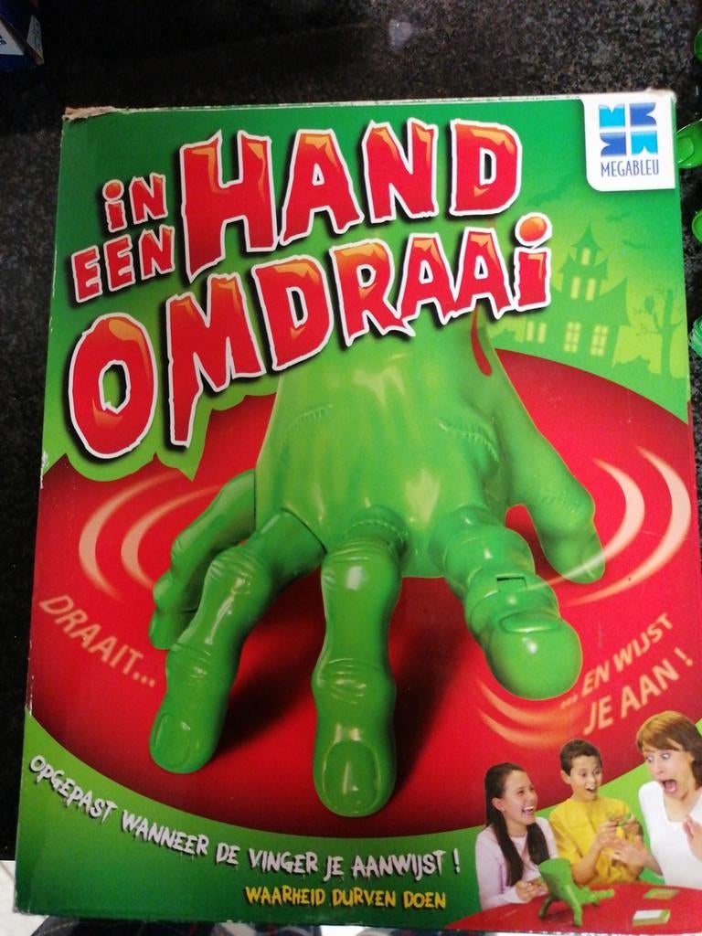 In een HANDOMDRAAI gezelschapsspel, Hobby en Vrije tijd, Ophalen of Verzenden, Zo goed als nieuw
