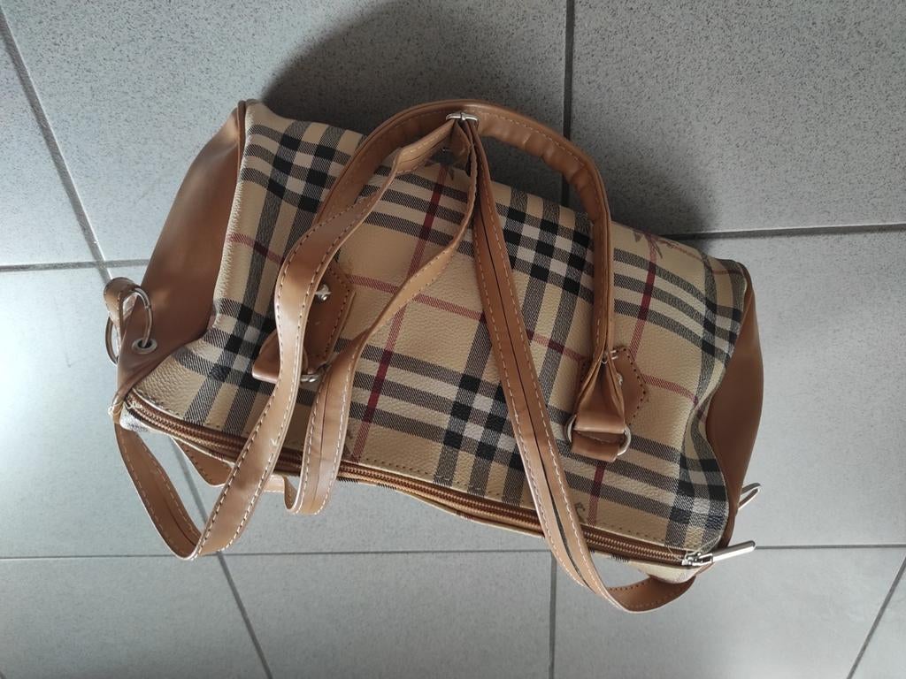 Handtas, Ophalen, Zo goed als nieuw