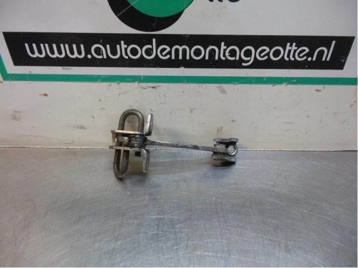 Butée 4portes arrière gauche d'un Opel Corsa (Corsa C 00-), -, Opel, Utilisé, -
