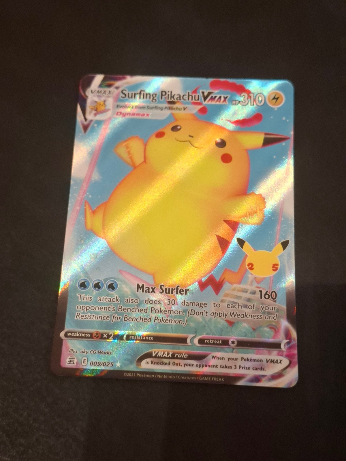Pokémon Surfing Pikachu VMAX 009/025 (Célébrations) — Près d, Enlèvement ou Envoi