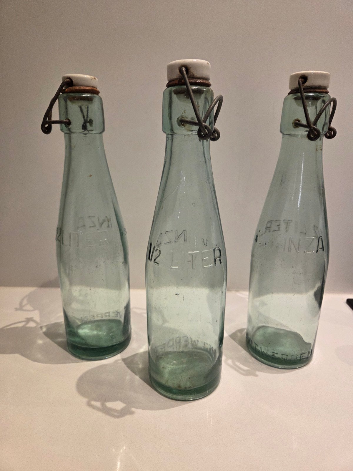 Vintage metalen flessenrek met 3 originele INZA melkflessen, Ophalen of Verzenden