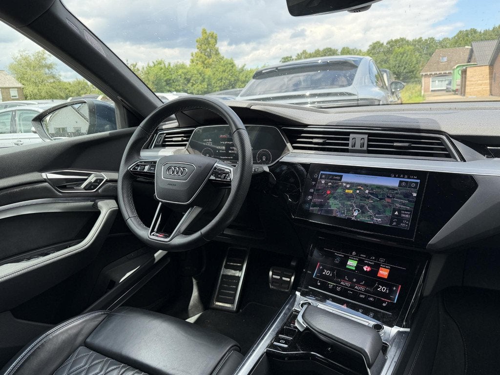 Audi Q8 Sportback e-tron 55 quattro S Edition Competition 11, Auto's, Audi, Automaat, Zwart, Automatische klimaatregeling, Blauw