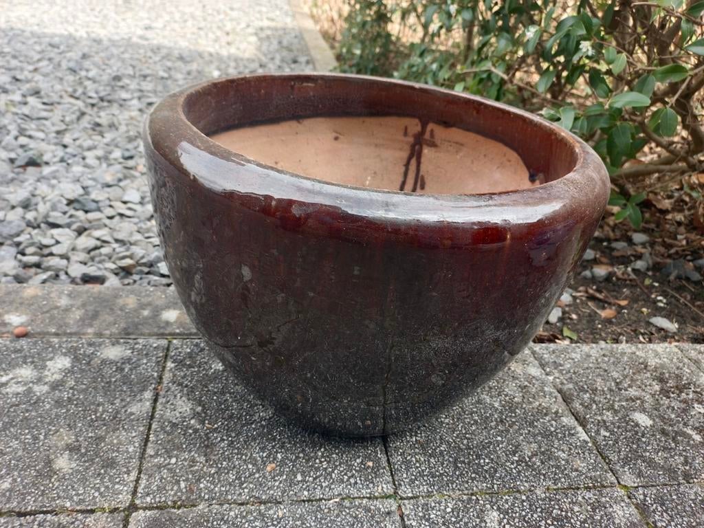 Geglazuurde bloempot, Ophalen