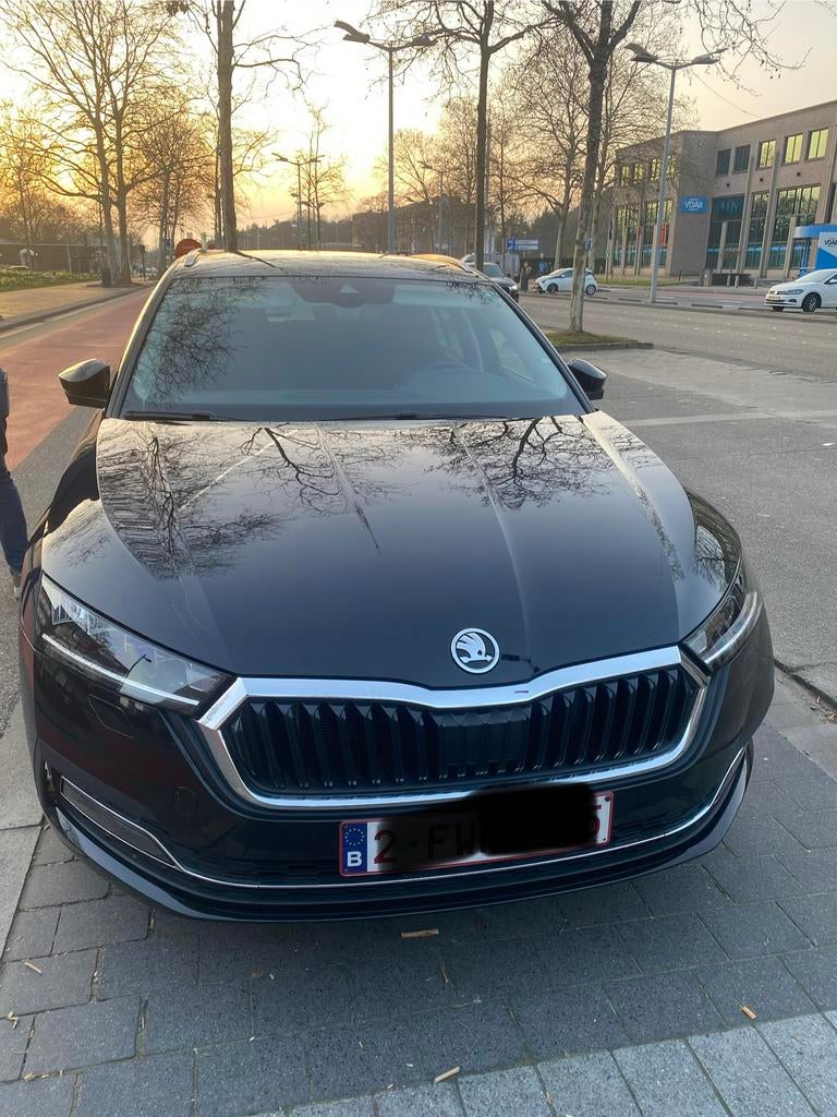 Skoda octavia combi 15tsi mhe family dsg 150 pk, Stof, 4 cilinders, Zwart, Particulier