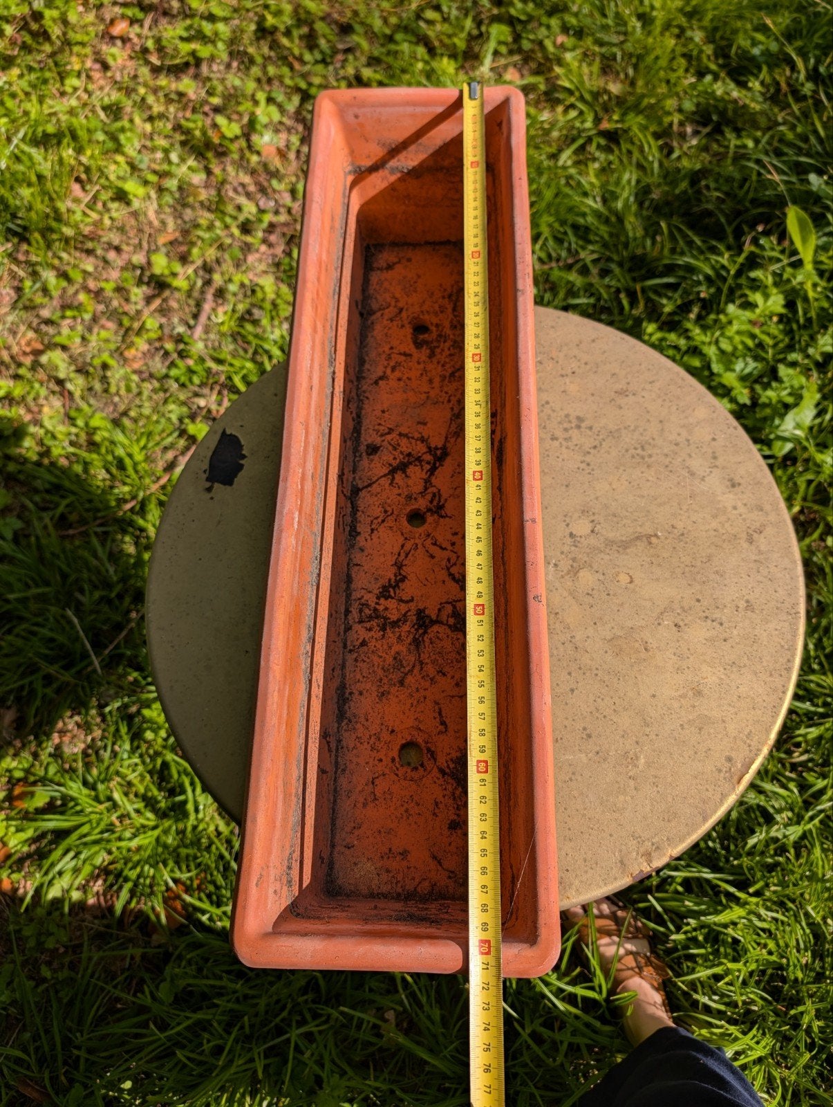 Langwerpige terracotta bloempot, Ophalen