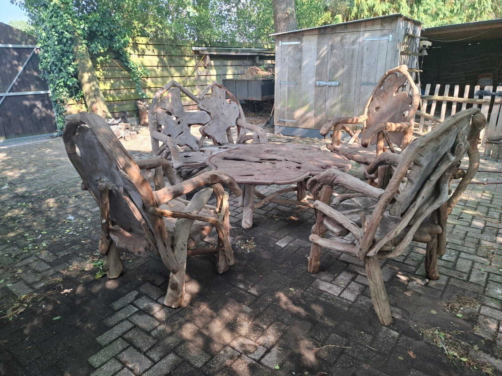 wortelhouten teak meubelen, Enlèvement
