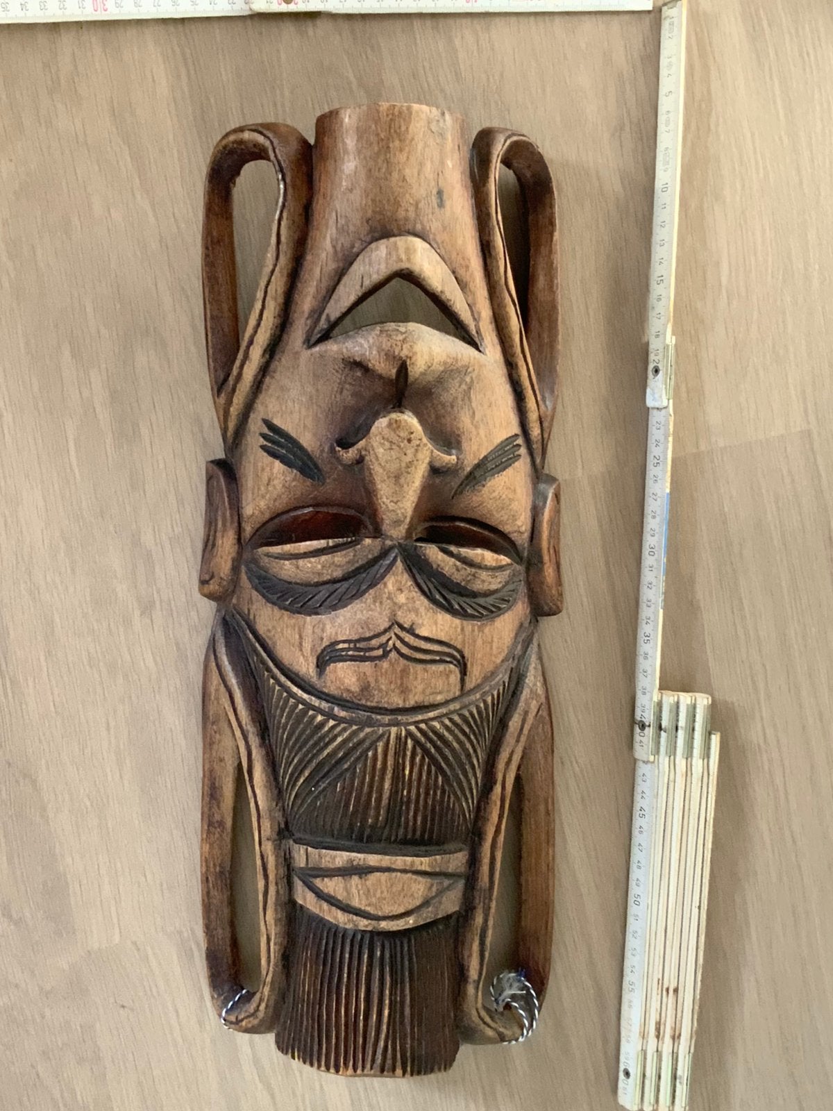 Afrikaans masker, Ophalen