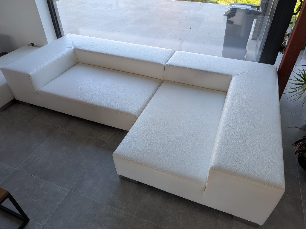 Kunstleren zetel hoeksalon met poef, Huis en Inrichting, Ophalen, Gebruikt, 100 tot 125 cm, 150 tot 200 cm
