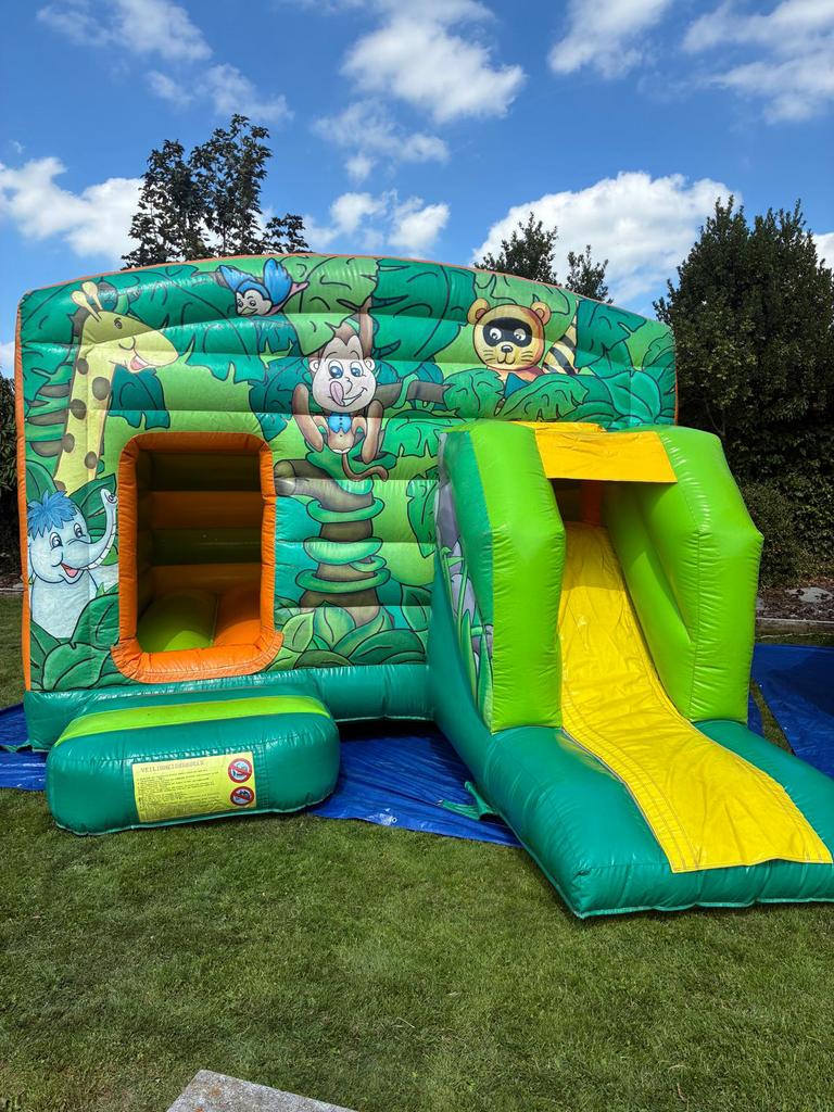 Springkasteel Jungle TE HUUR, Ophalen of Verzenden, Zo goed als nieuw