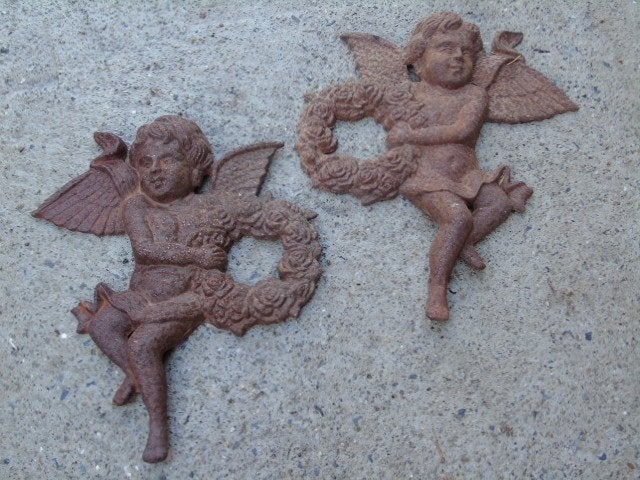 2 roestige gietijzeren wandengelen, Tuin en Terras, Ophalen of Verzenden, Nieuw