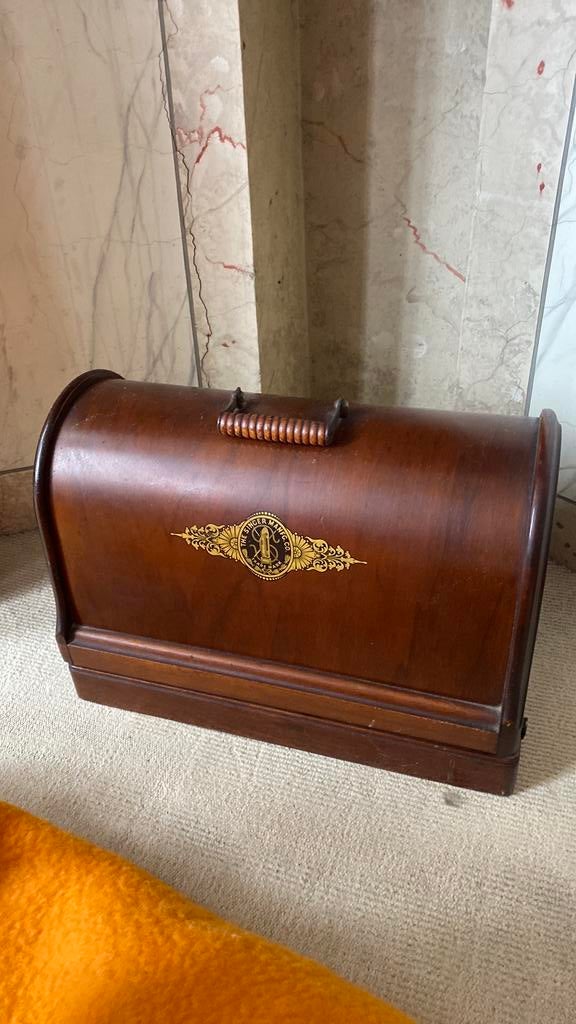 Oude singer naaimachine, Ophalen