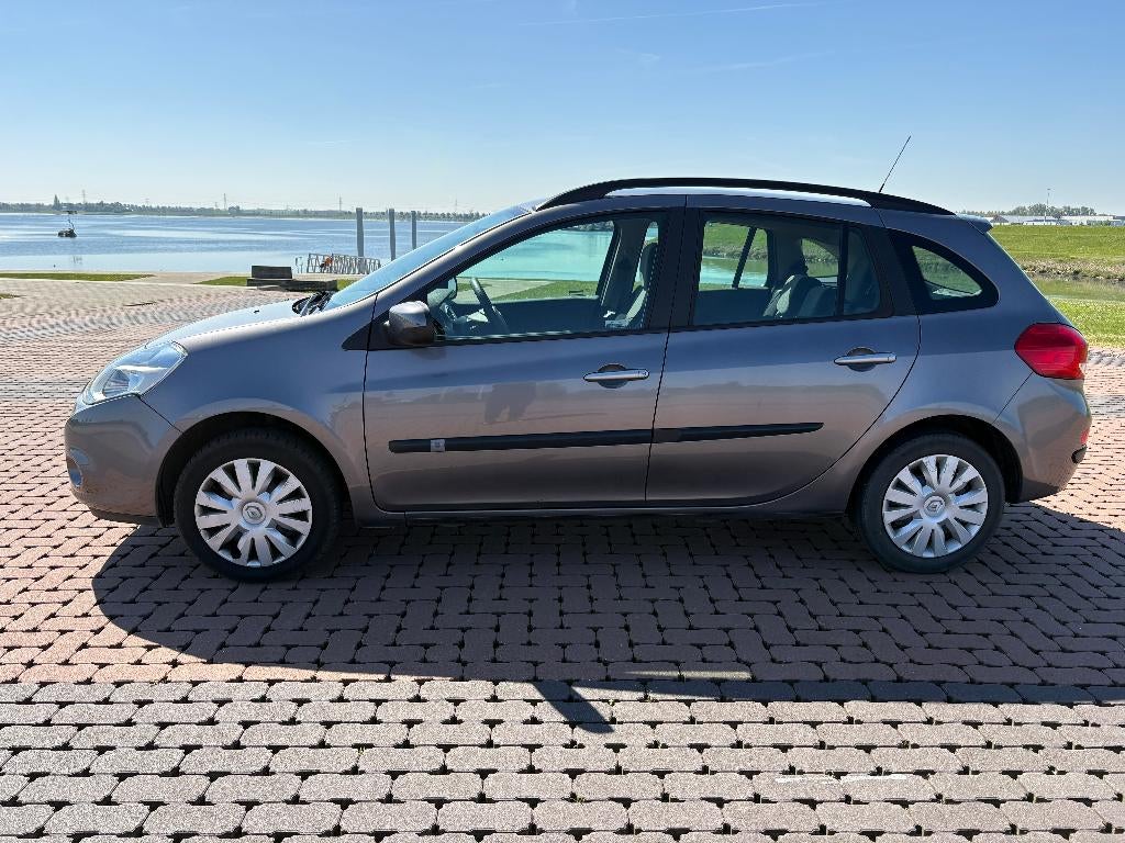 Renault Clio Grandtour 1.2 benzine – 2009 – 63.000 km, Auto's, Voorwielaandrijving, Stof, Beige, 5 deurs