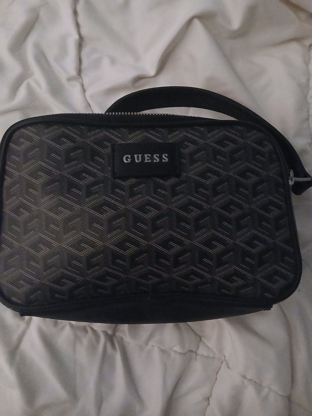 une sacoche GUESS a vendre elle et en tres bon etat, Enlèvement ou Envoi, Utilisé, Noir, Homme