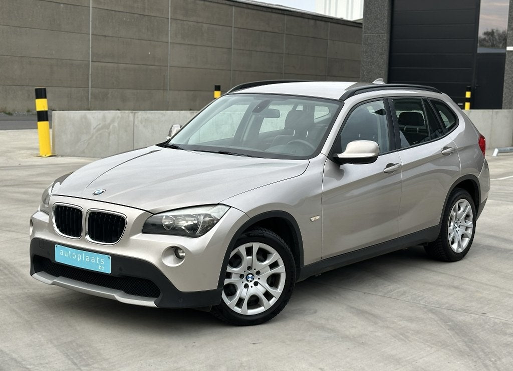 BMW X1 sDrive18d 2011 Automaat 130450km Navi Cruise Leder, Auto's, 1995 cc, Zwart, Beige, Leder