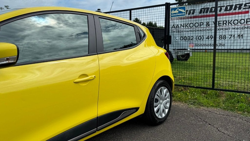 Renault Clio 1.2i | Limited | Navi - 24.000 Km's | km's, Autos, Renault, Euro 5, Achat, 4 portes, Jaune