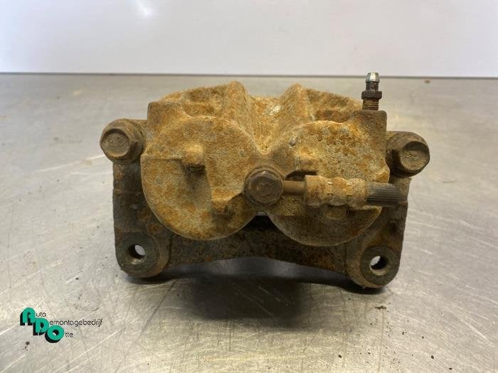 Etrier de frein (pince) avant gauche d'un Mitsubishi Pajero, -, 3 mois de garantie, Utilisé, Mitsubishi