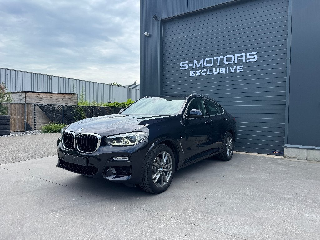 BMW X4 20i xDrive M SPORT / LED / HEADUP/ TREKHAAK /GARANTIE, Automaat, 1800 kg, 4 cilinders, Zwart