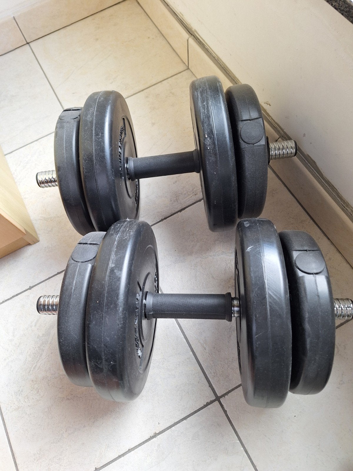 2 haltères (2 x 15 kg), Enlèvement