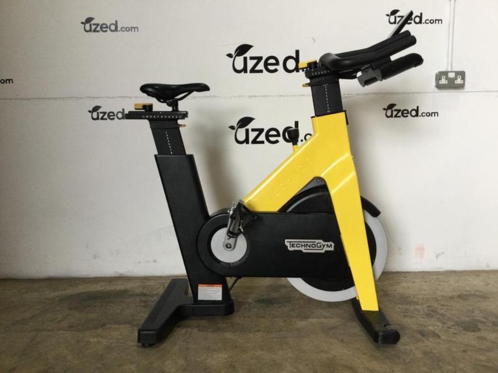 Lot de 5 vélos spinning - Technogym group cycle jaune sans c, Enlèvement ou Envoi, Utilisé, Jambes, Autres types
