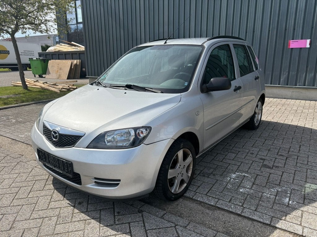 Mazda 2 1.4 benzine Automaat bj 2003 147923 km Airco, Auto's, Mazda, Automaat, Bedrijf, Grijs, Elektrische ramen